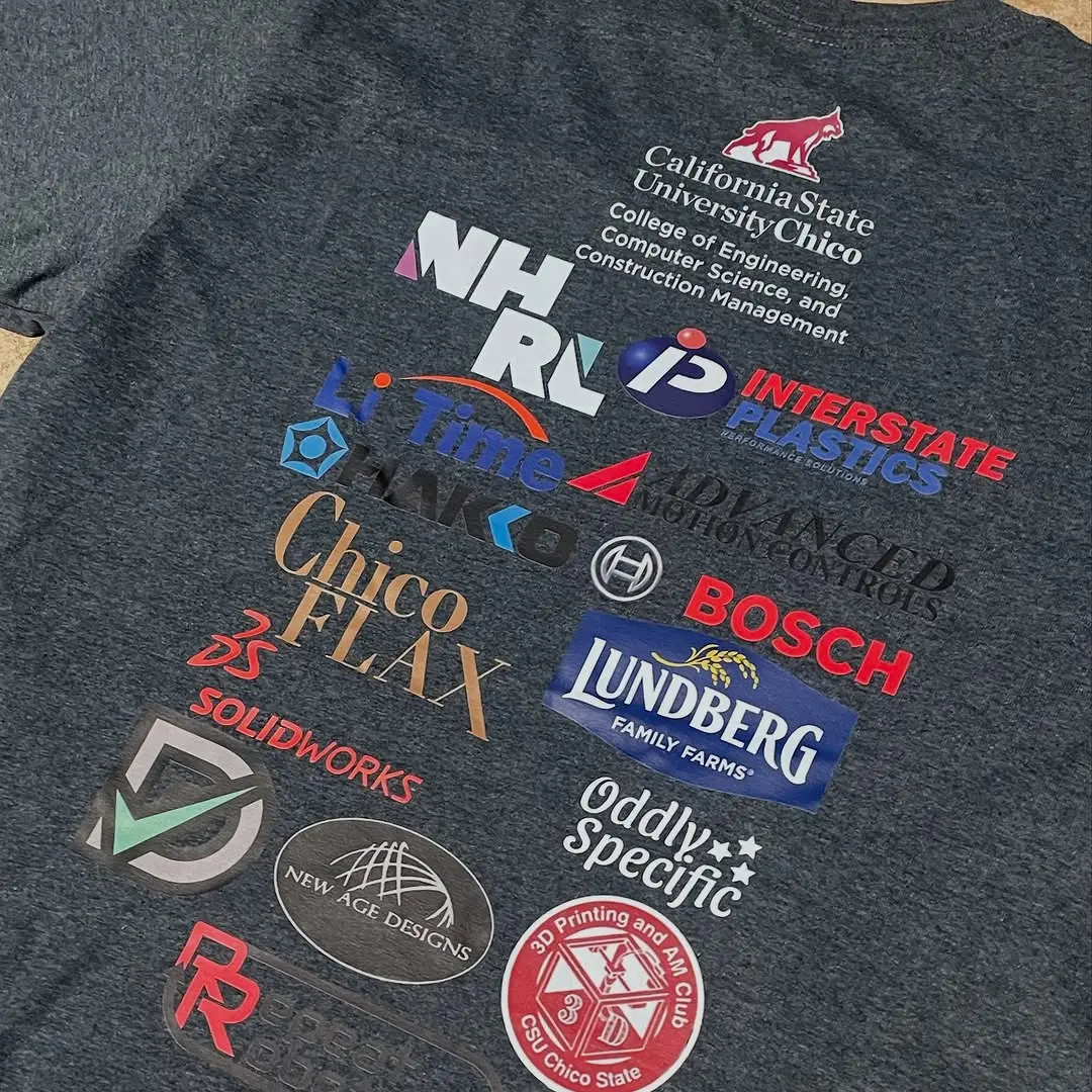 Multicolor sponsor print on a Chico State Mechatronics shirt