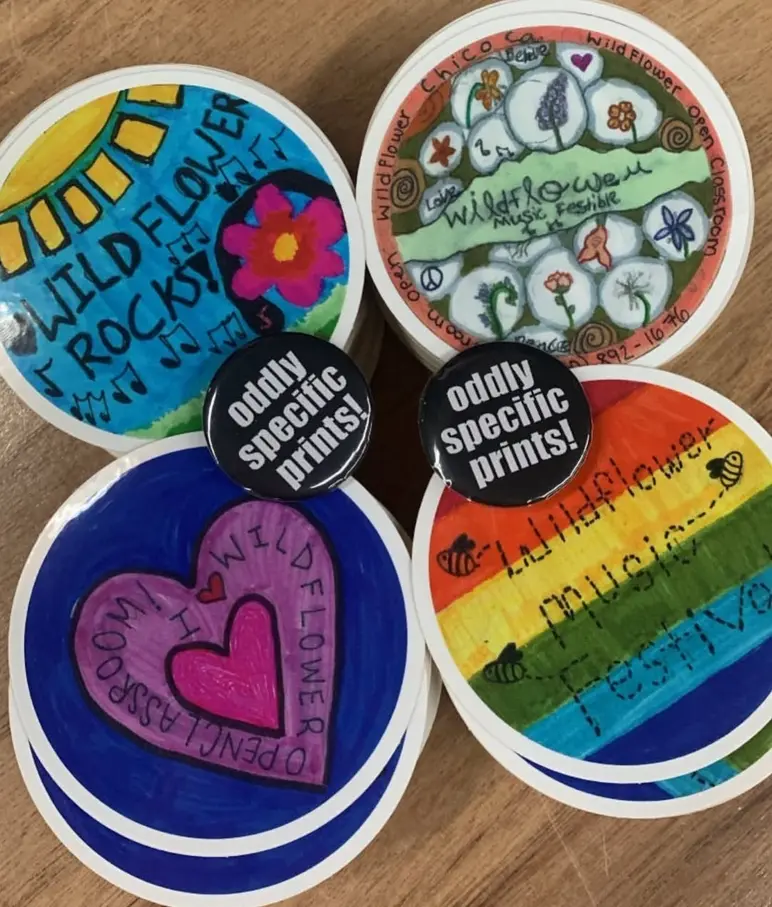 Colorful student-designed stickers for Wildflower Open Classroom